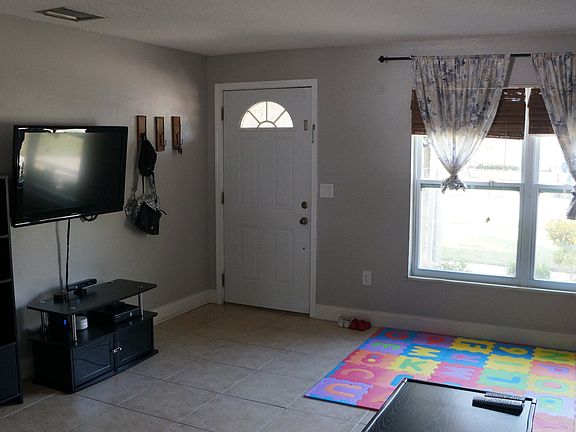 Living room facing frt door.