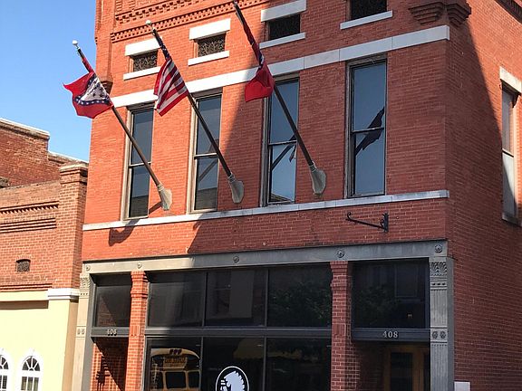 406 S Main Loft entrance is located to the left of the building.