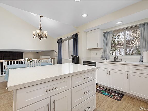 Brand new cabinets, quartz counters, flooring