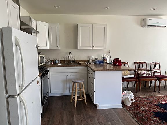 Kitchen. A/C unit on top right