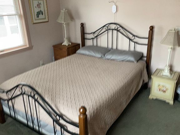 Bedroom 1 with Queen size bed. Blankets and linens included.