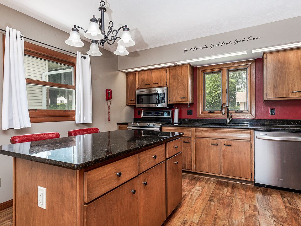 Granite kitchen counter tops and island. SS appliances.