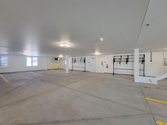 Parking garage ($130/month per space) and bike racks