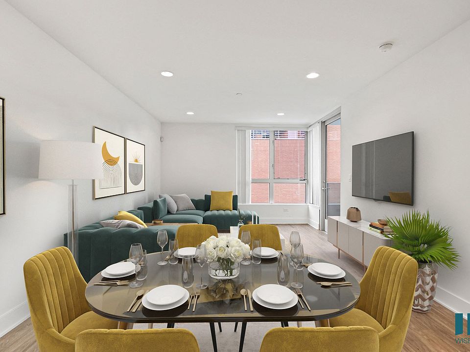 Open-Concept Dining and Living Room with Large-Size Windows, Vinyl Flooring, and Recessed Lighting