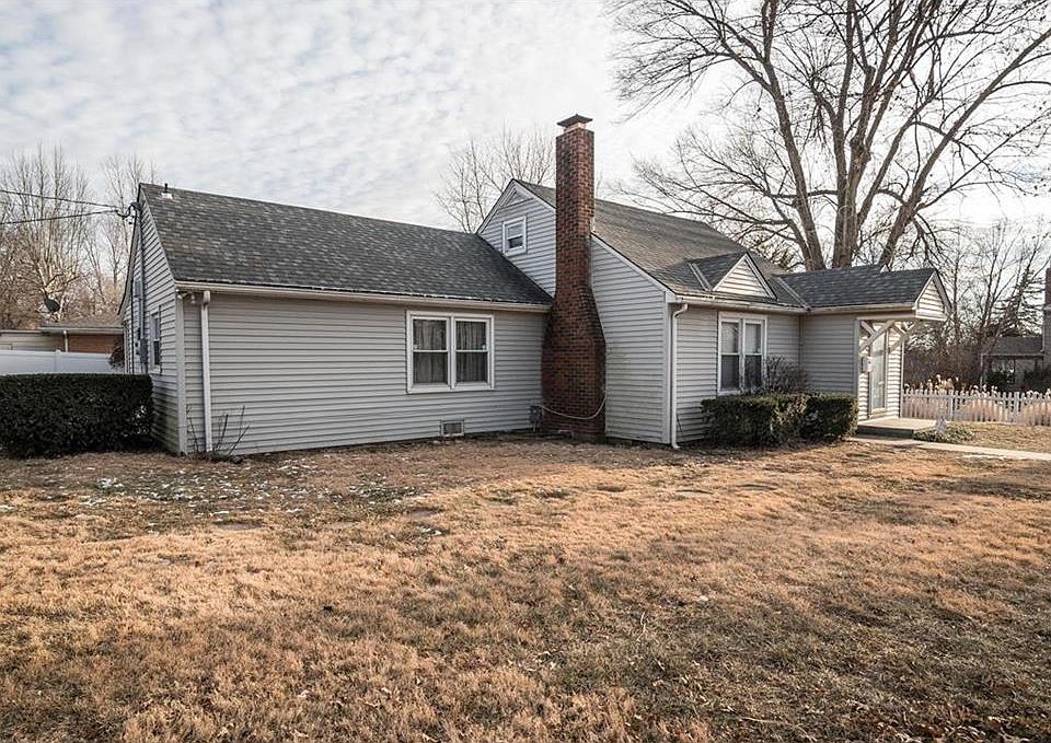 711 E Walnut, Belton, Missouri.   This is a charming 1910 Cape Cod Colonial that has been updated to standards of today.