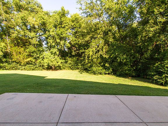 Treed private backyard