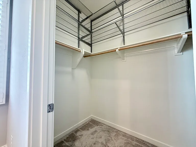 Closet 1 of 2 in primary bedroom: walk-in