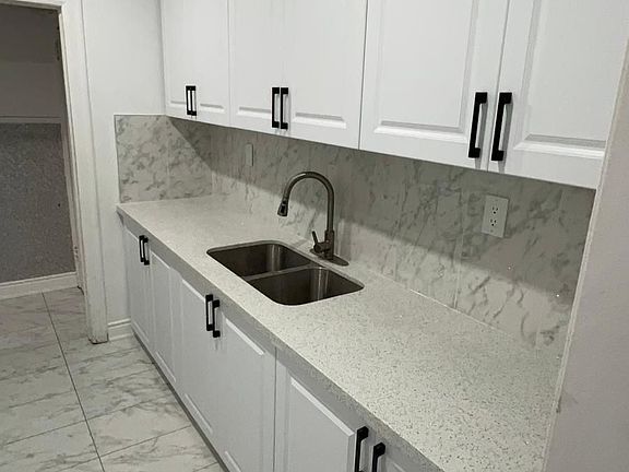2nd image of 213 Queen St W