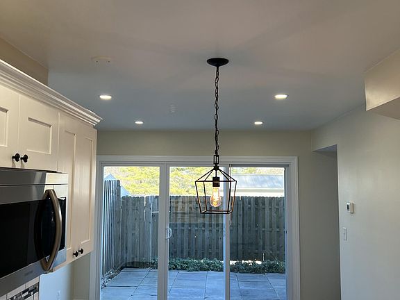 Eat-in kitchen overlooks your private balcony