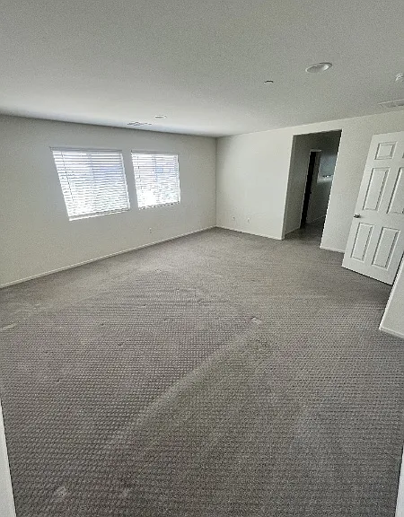Master Bedroom with lots of natural light! View of Mt. Rubbioux