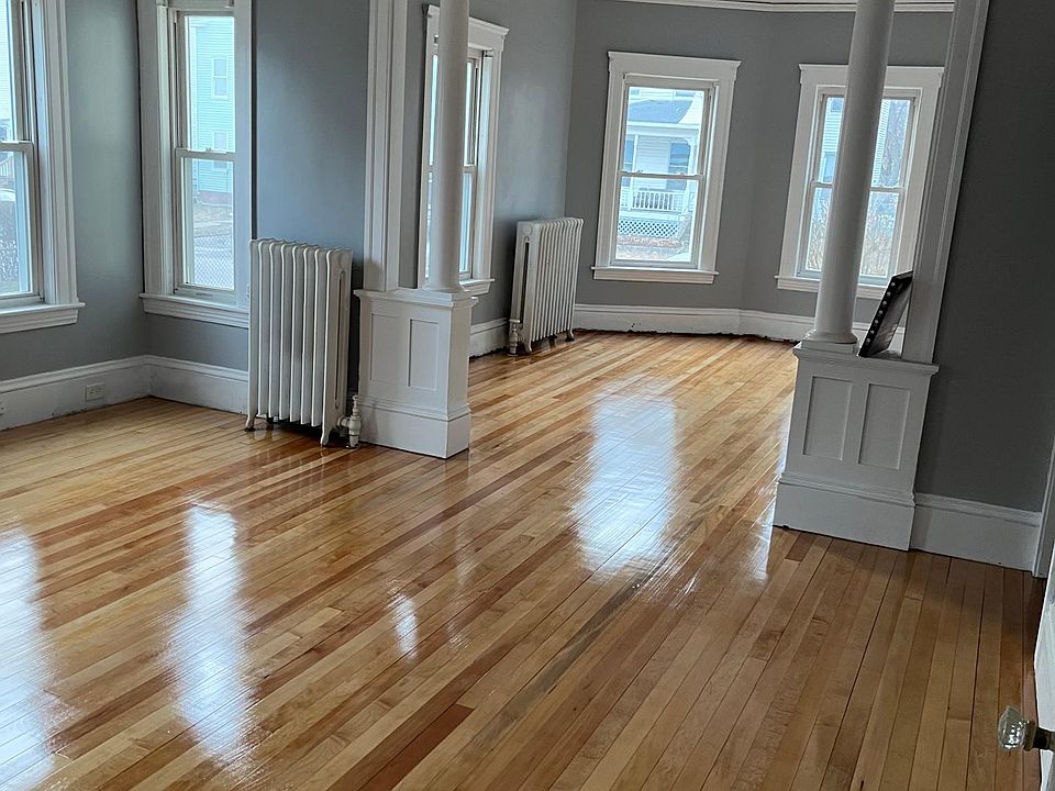 living and dining rooms/ newly sanded hardwood floor throughout