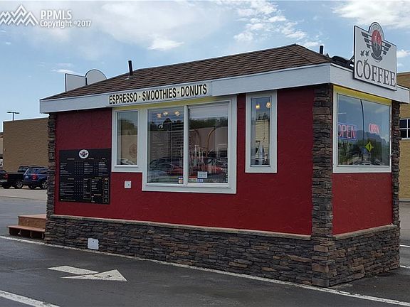 This side of the building has no clearance issues, allowing tall trucks to drive