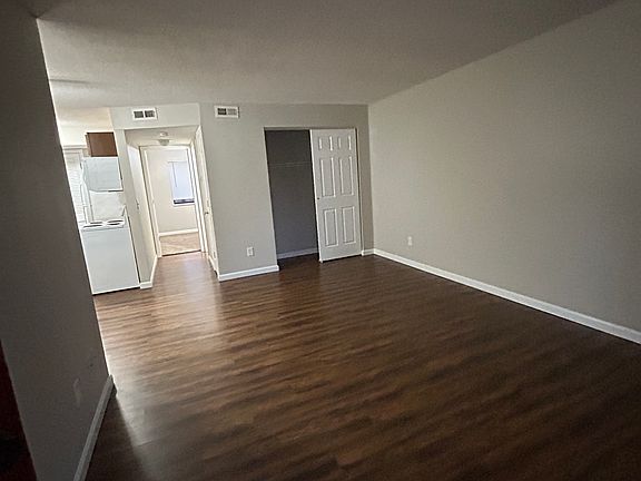 Large spacious living area with closet for storage