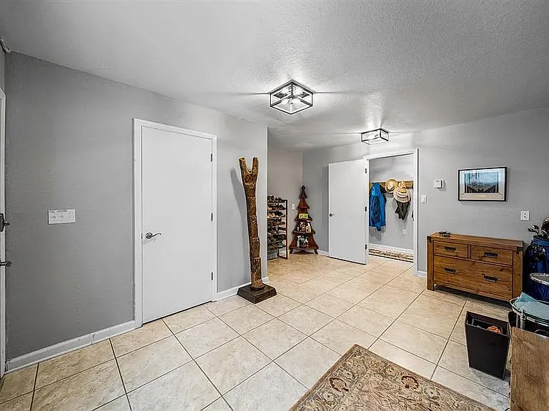 Storage/office space off garage with exterior access - lower level
