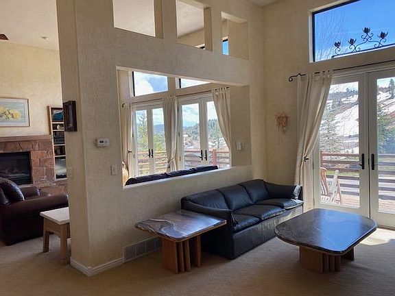 Open floor plan with views of ski runs. Gas fireplace with double open family rooms, breakfast nook and formal dining.