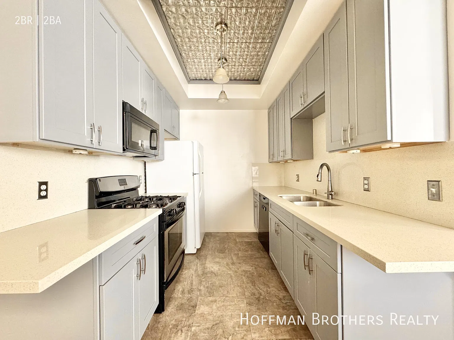 **2 Weeks Free** Spacious 2BR/2BA with Central A/C, Hardwood Floors, Dining Nook & 2-Car Tandem P... — Photo 2