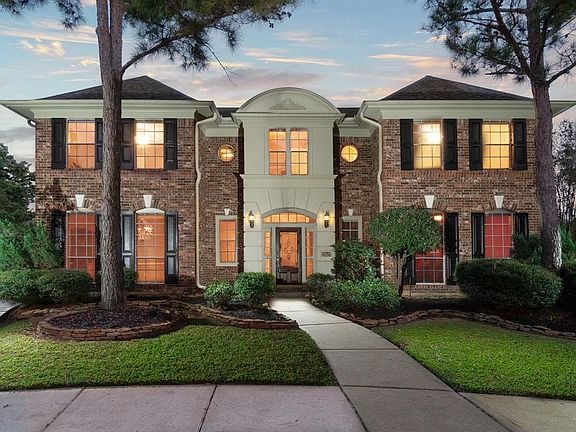 This home exudes warmth and beckons your guest to come in and stay awhile!