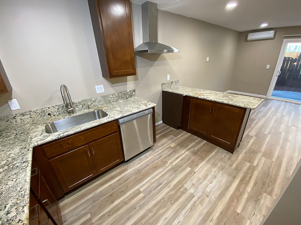 New counter, new dishwasher and new sink.