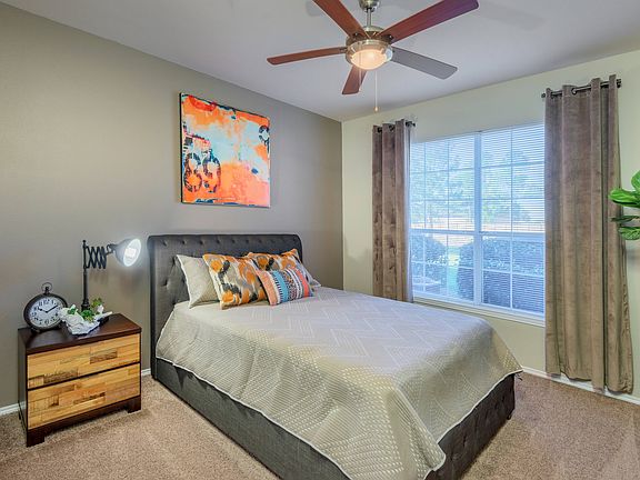 Spacious Bedroom with Ceiling Fan