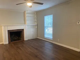 Wood burning fireplace and built in cabinet