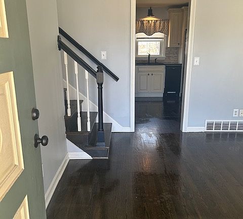 Front door entrance; Walking into the main level of the home