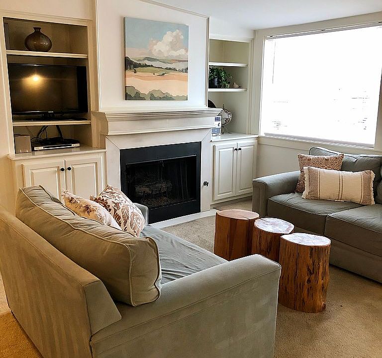 Charming living & fireplace.