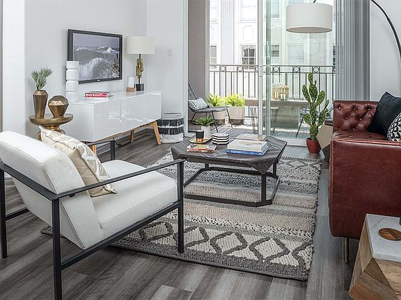 Apartment Living Room with Wood Floor Type and Balcony.