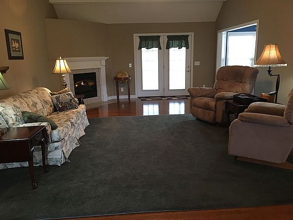 French doors lead to covered