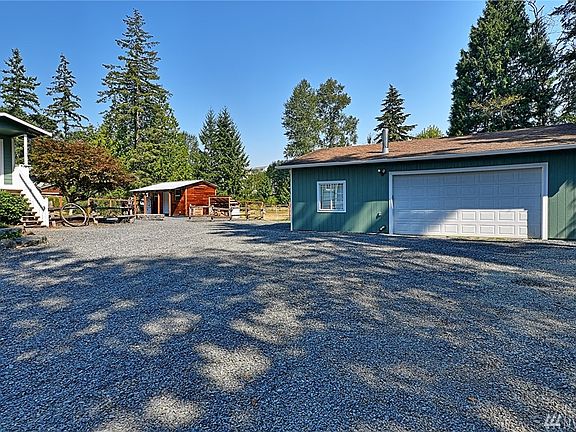 Detached garage with shop and separate shed that can be used as an office, virtual classroom or game space.  The possibilities are endless!