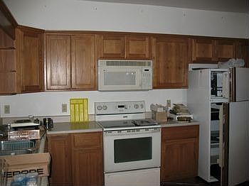Beautiful newer oak cabinets in the large kitchen, there is so much storage room here!