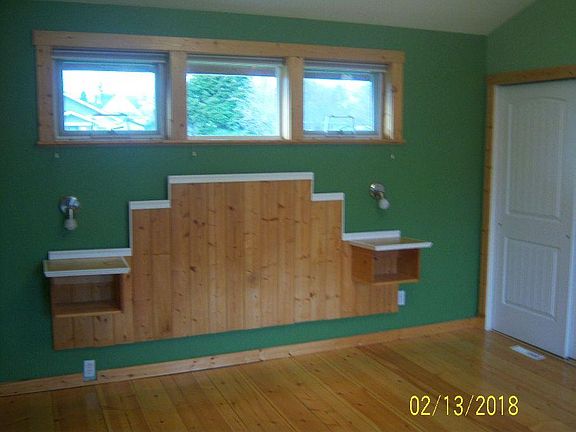 Master bedroom with built in head board