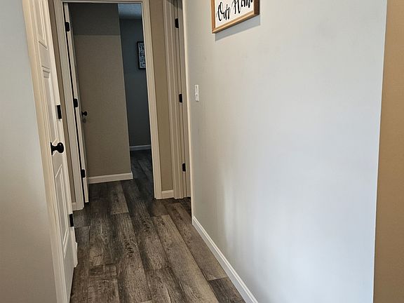 Hallway to bedrooms and bath