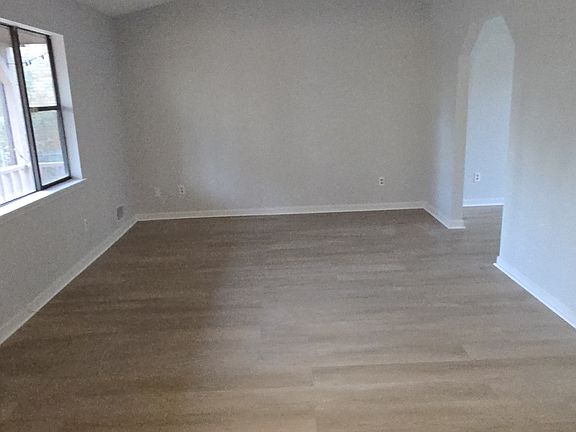 large formal living with valted ceiling