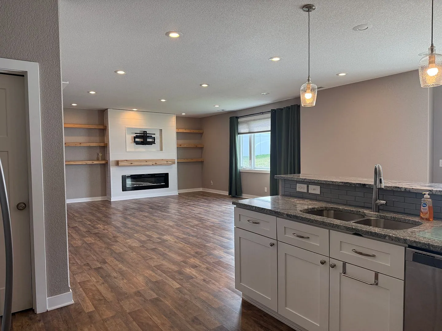 Spacious 4-Bedroom Twin Home | 3-Stall Garage + Fenced Yard — Photo 1