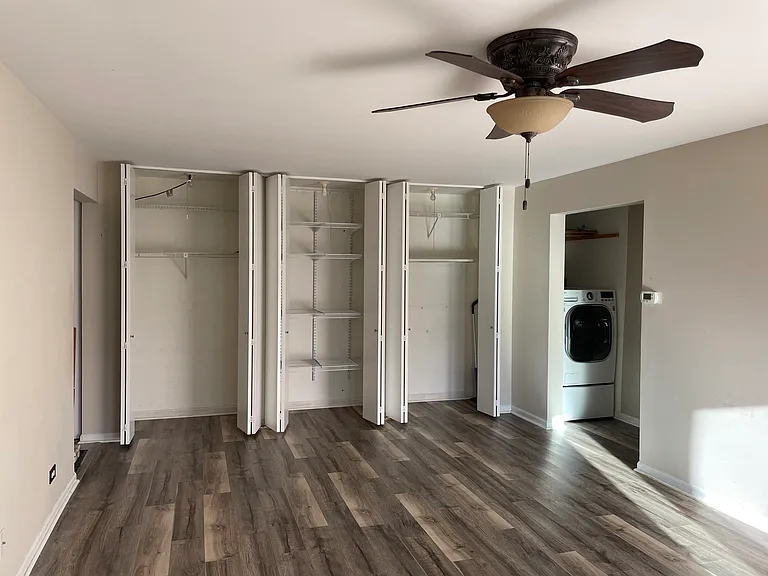 Storage closets in living room area. Washer/dryer combo machine. additional pay-to-use washer/dryer machines upstairs.