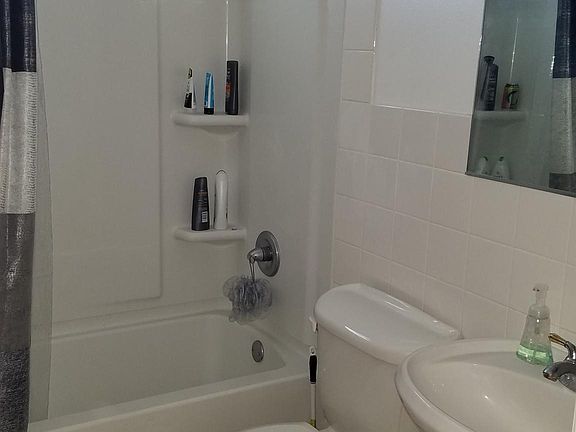 new tub w/surround for easy cleaning