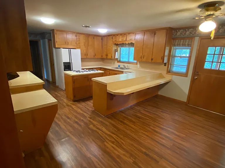 Kitchen/dining area with refrigerator , range and dishwasher