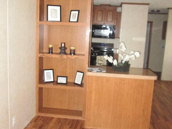 Beautiful hard wood floors throughout- wood trim and impecab