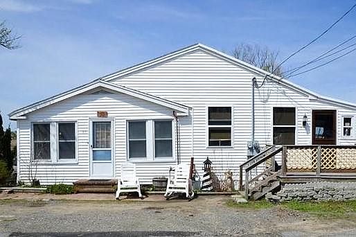 Front of House. Accessory apartment is the right side with d