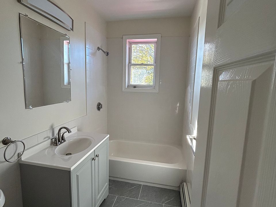 Bathroom: Freshly renovated bathroom with modern fixtures and clean design.