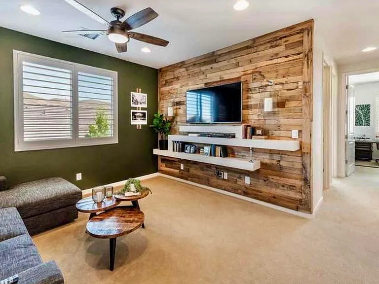 Bonus room with custom entertainment center and shelving