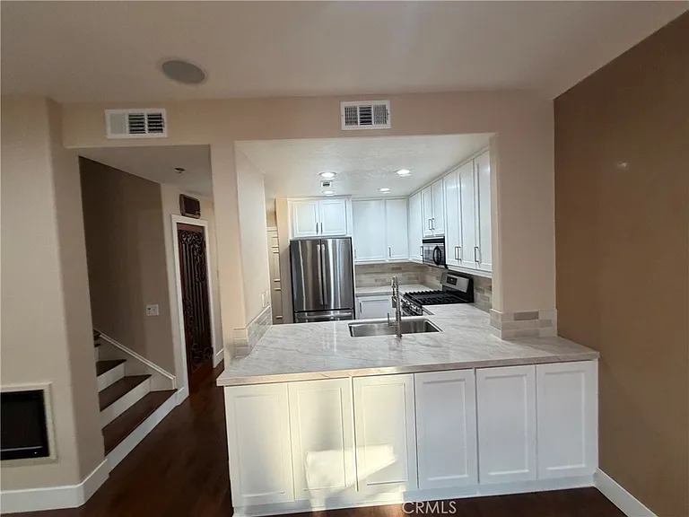 27 Tradewinds — Photo 2