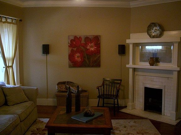 Spacious rooms for comfortable living. Oogle over your original fireplaces and heart-of-pine floors!