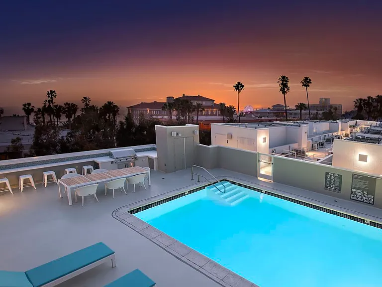 Rooftop Swimming Pool and BBQ Area with Seating