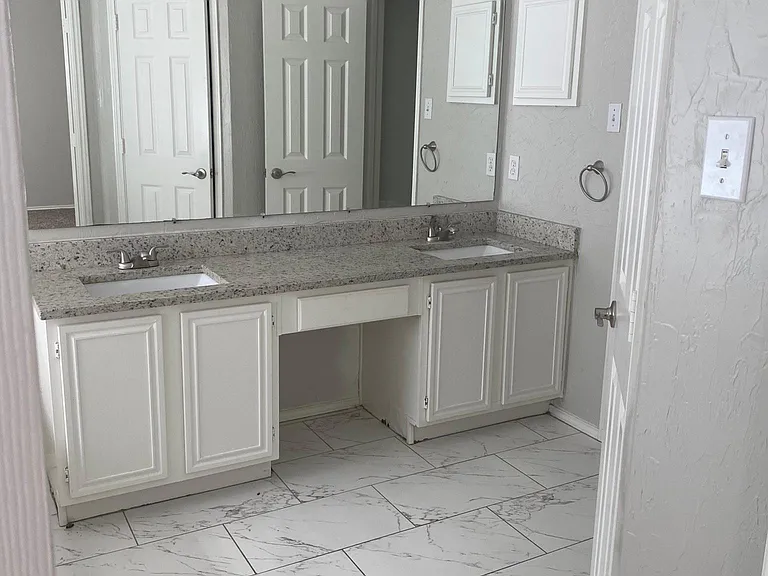 Master bathroom with dual vanities.
