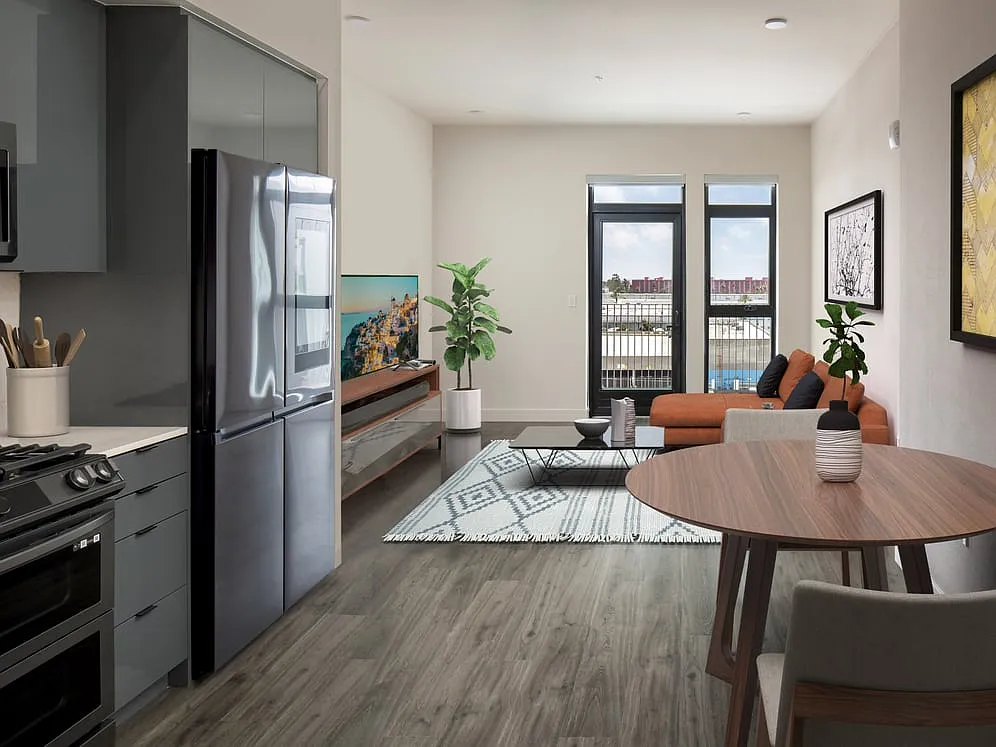 Upgrade Package Kitchen, living, and dining area with hard-surface flooring throughout - AVA Arts District