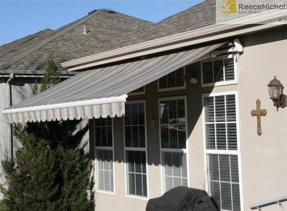 Remote Retractable Awning to Shade The Windows Or The Deck For Comfort From The Sun