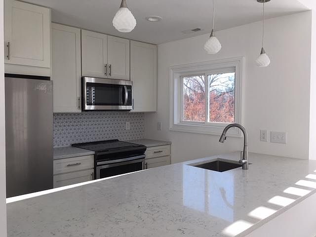 Beautiful Quartz countertops and all new stainless appliance