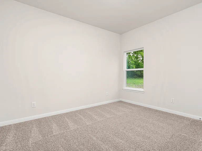 The secondary bedrooms are a great space for a children's bedroom, guest room, or home office.