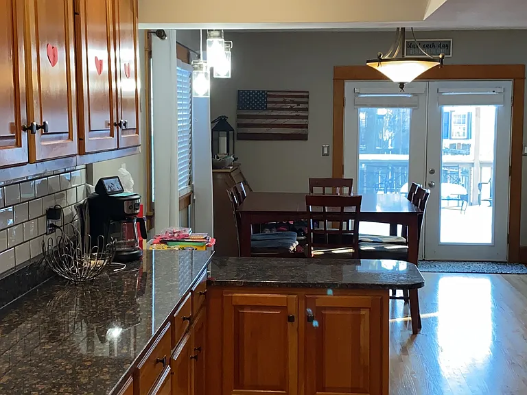 Rest of kitchen (range is behind, double ovens and fridge on right)